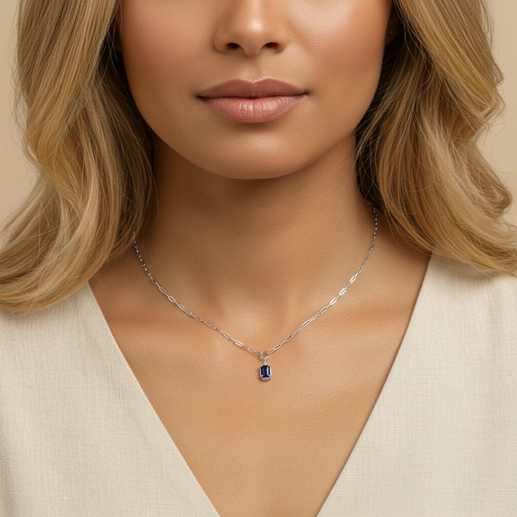 10K White Gold Emerald Cut 6x4 MM Blue Sapphire Solitaire Pendant Necklace - 18 inch