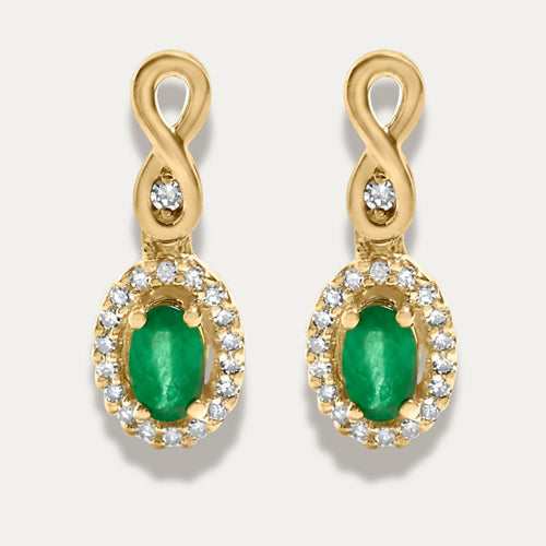 Gold earrings with green gemstones and small diamonds on a white background